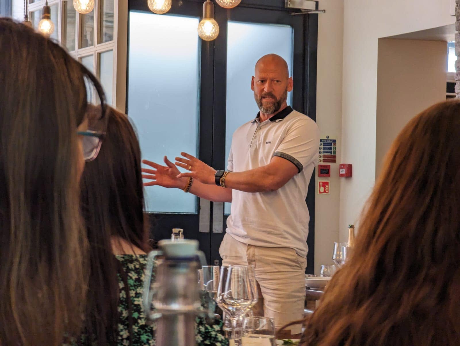 James Wyatt, founder of Soulful Stays and Coach and Stay coach, presenting to business owners at a workshop